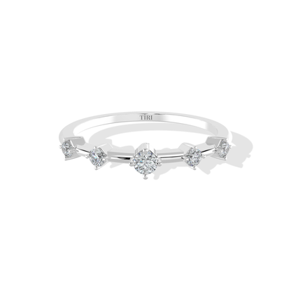 Tiri 0.24 TW diamond ring featuring a sleek band and sparkling diamonds set in a luxurious jewelry design.