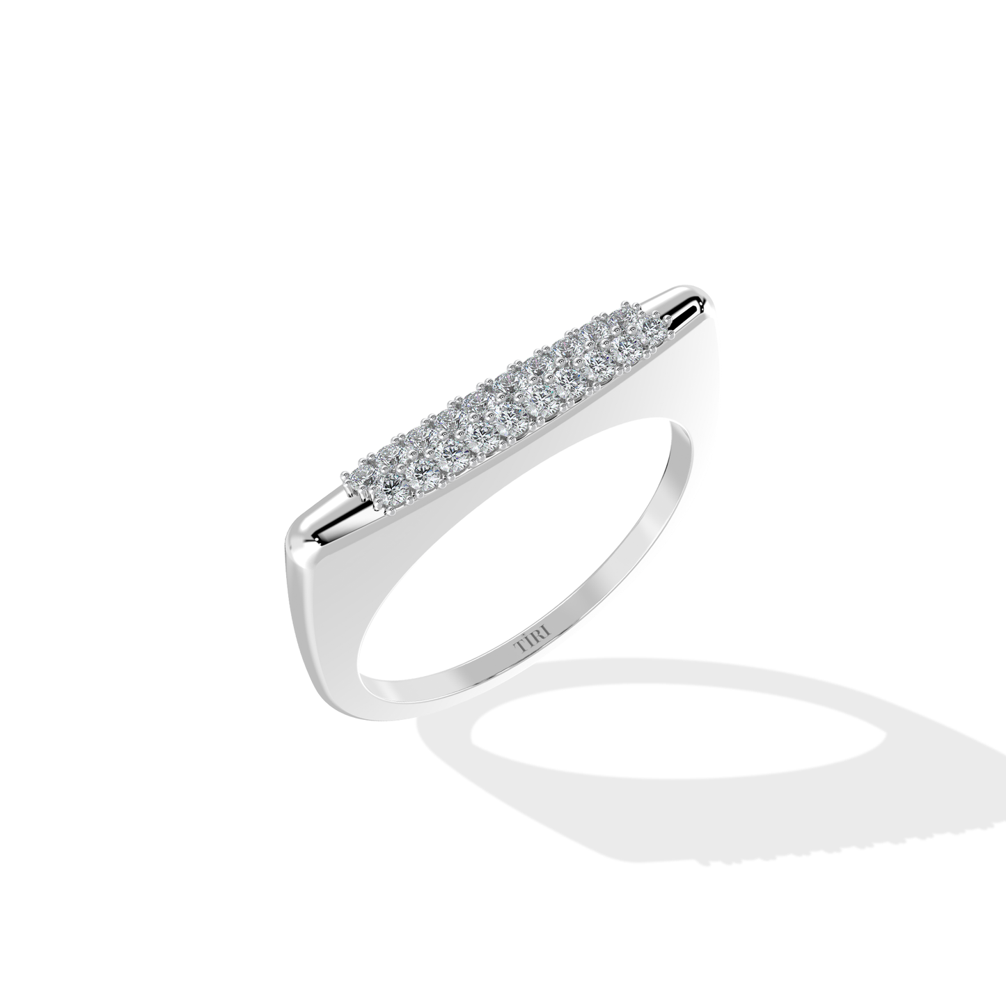 Tiri 0.30 TW diamond ring featuring a sleek band with a sparkling central diamond and intricate design details