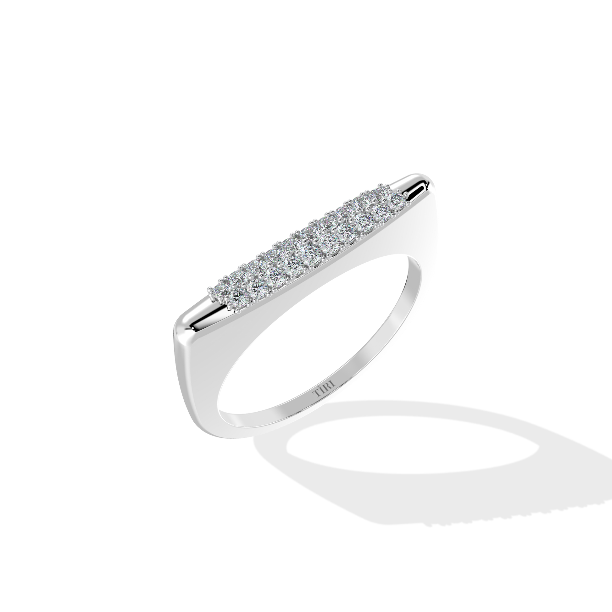 Tiri 0.30 TW diamond ring featuring a sleek band with a sparkling central diamond and intricate design details