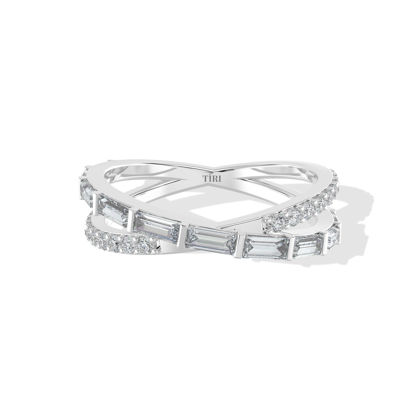 Tiri 0.75 TW diamond ring featuring a sleek band with sparkling diamonds and a polished silver finish.