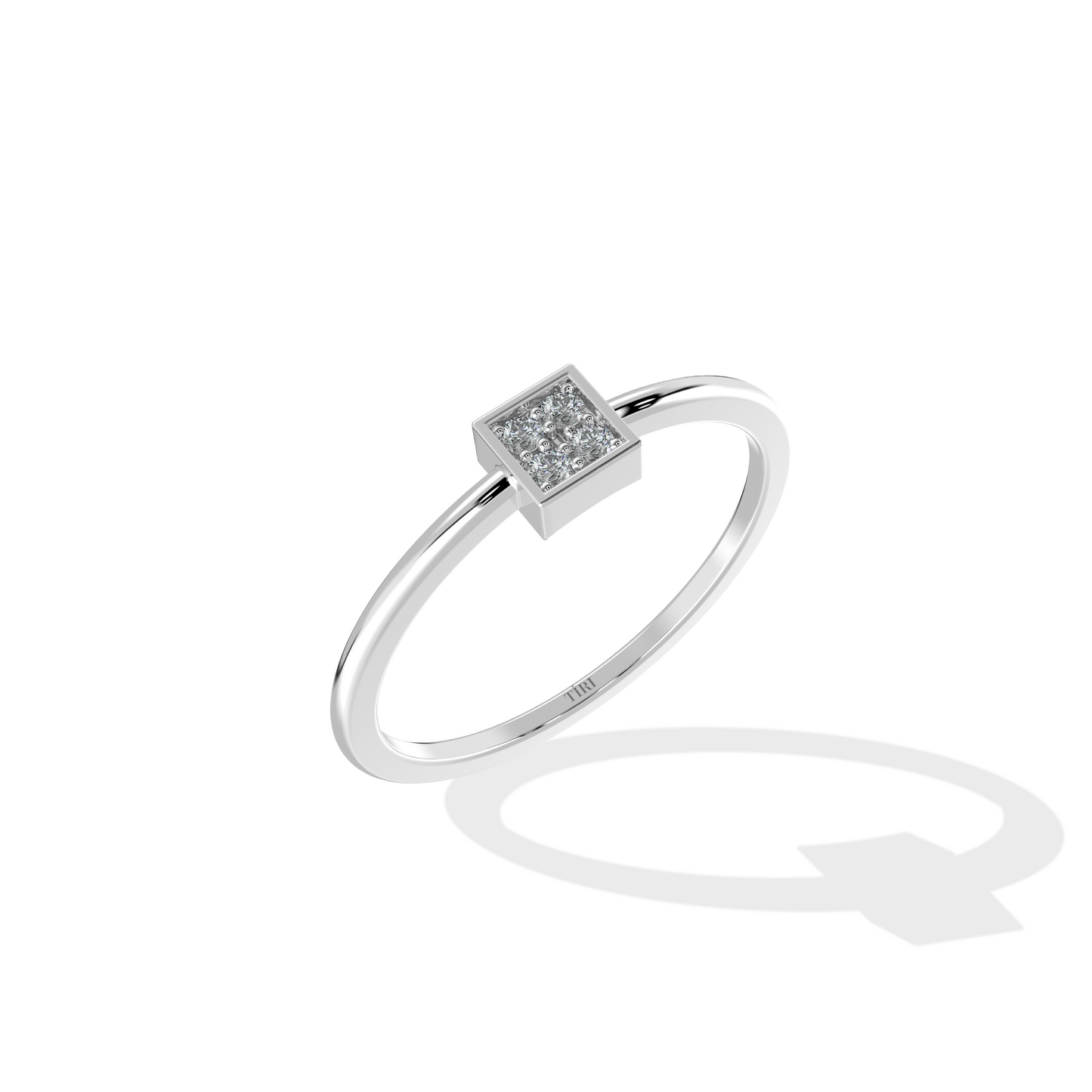White gold diamond cluster ring with a round brilliant setting and pave accented band. Luxury fine jewelry.