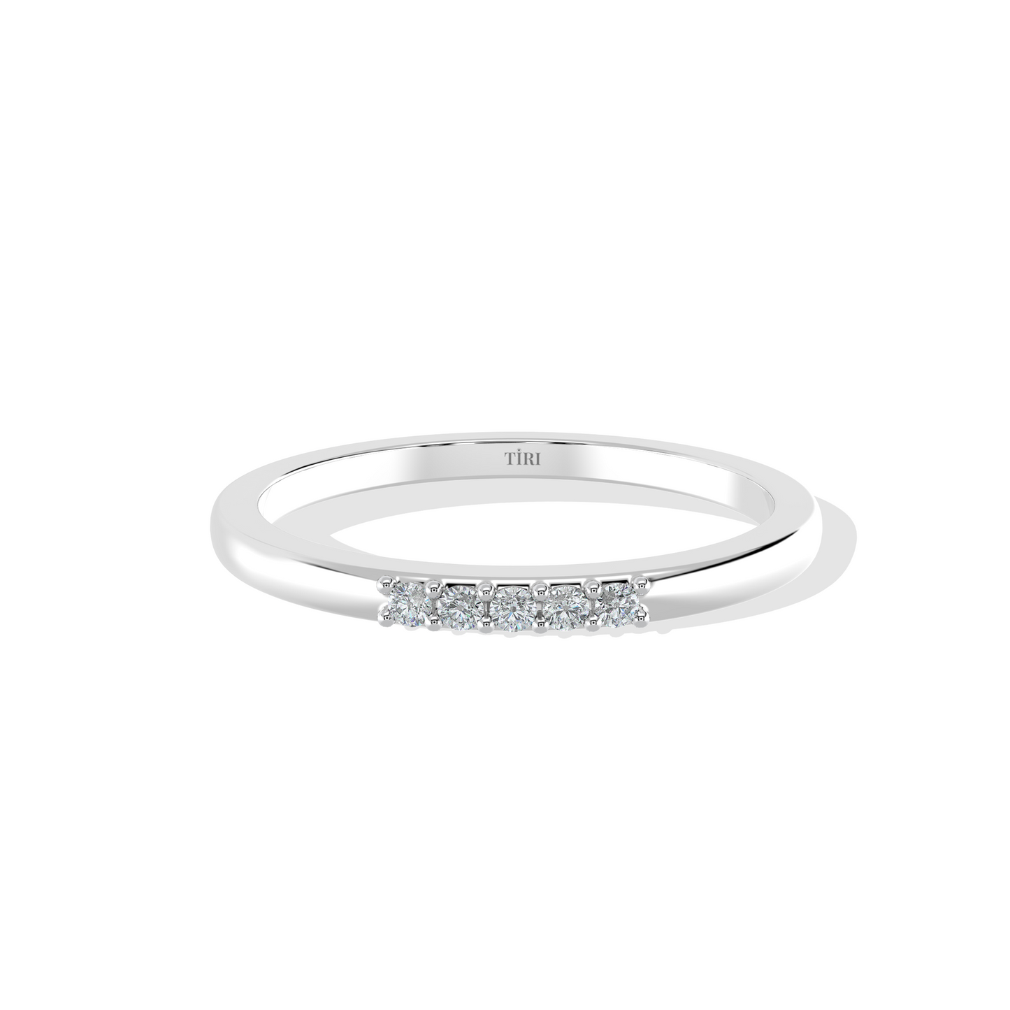 Silver Auric Linea band by Tiri, featuring sleek minimalist design in polished silver, displayed on a neutral background