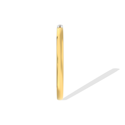 Yellow gold three-stone diamond ring featuring three round brilliant-cut stones. Classic trilogy engagement ring.