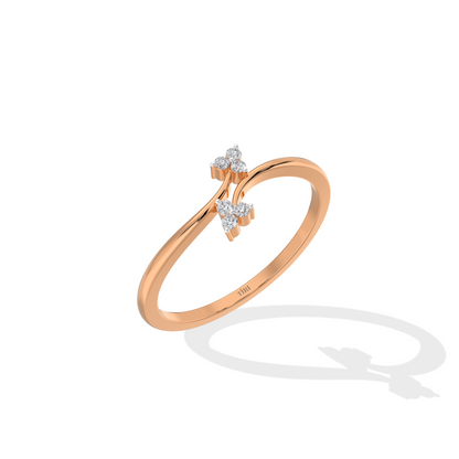 Rose gold oval diamond engagement ring set horizontally (East-West setting) with a halo of accent stones and a pave band