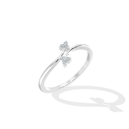 White gold oval diamond engagement ring set horizontally (East-West setting) with a halo of accent stones and a pave band