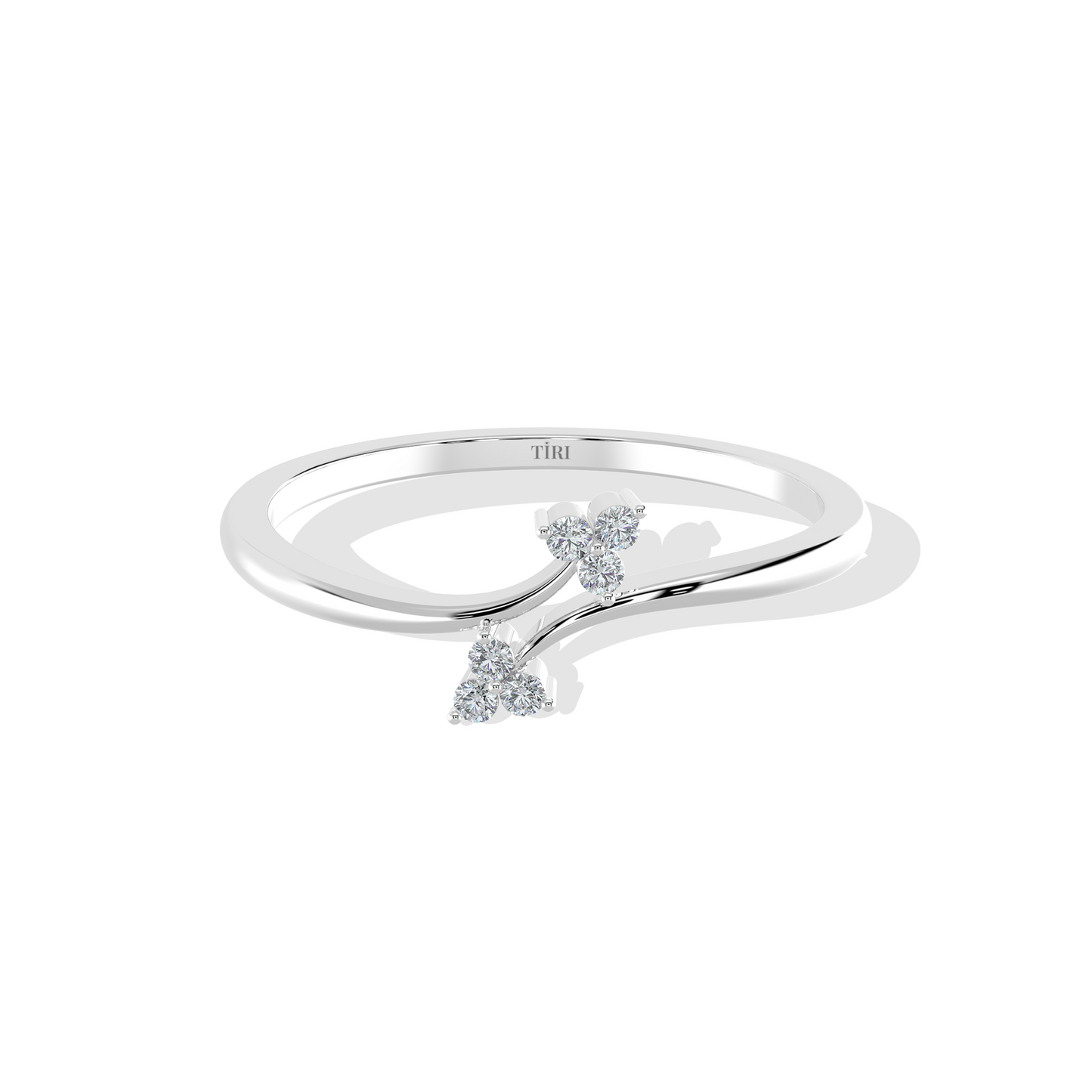 White gold oval diamond engagement ring set horizontally (East-West setting) with a halo of accent stones and a pave band