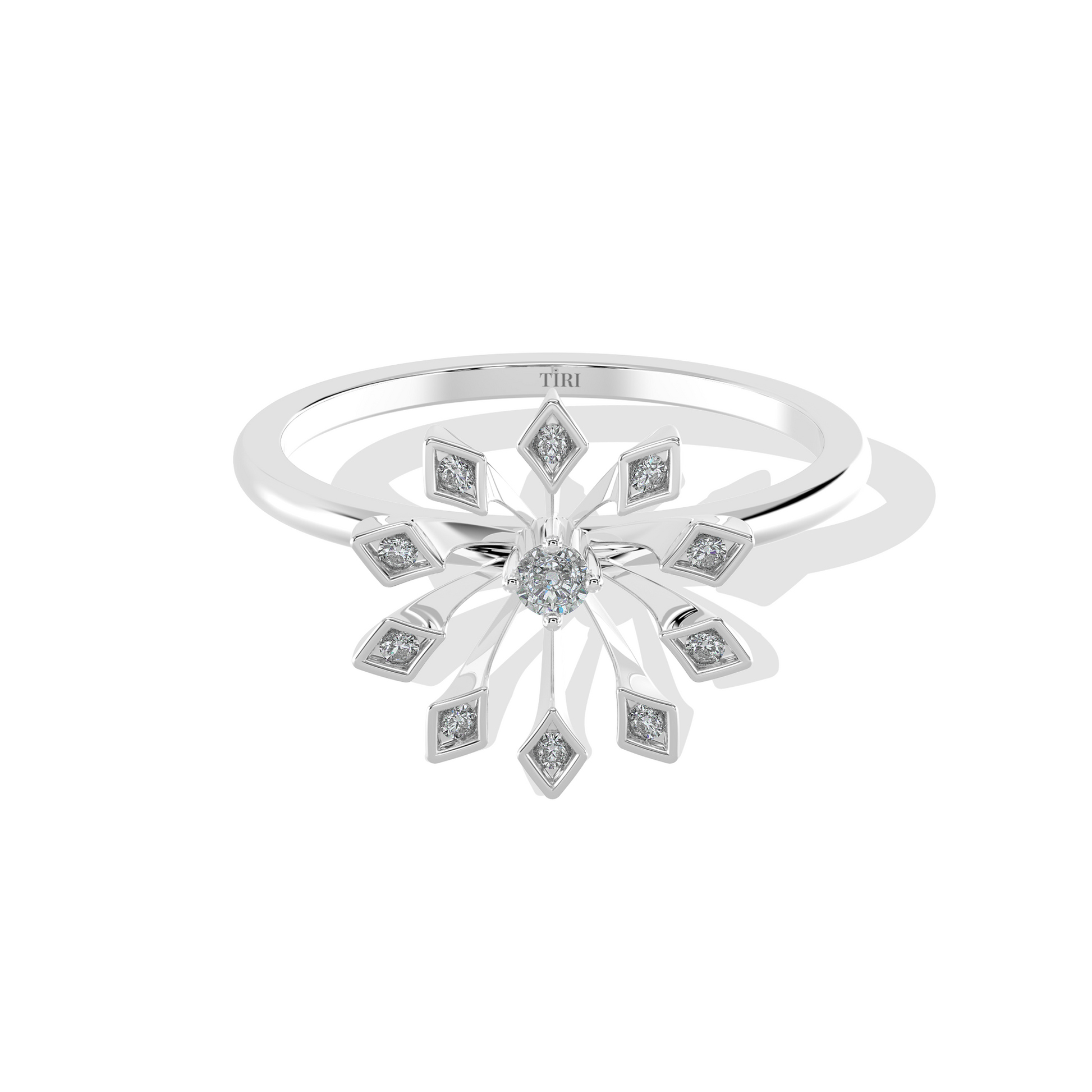 White gold round solitaire diamond engagement ring with a delicate thin band. Classic fine jewelry