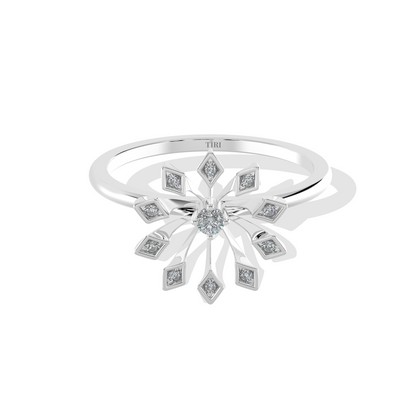 White gold round solitaire diamond engagement ring with a delicate thin band. Classic fine jewelry