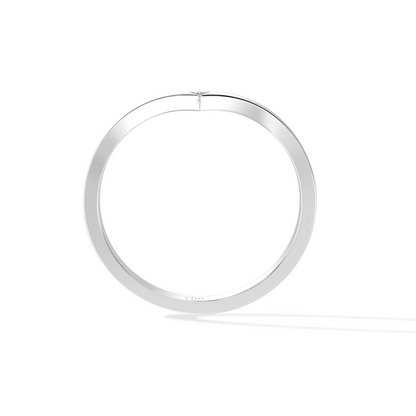 Silver Mini Radiance Ring by Tiri, close-up of the delicate silver ring with a small radiant design on a white background