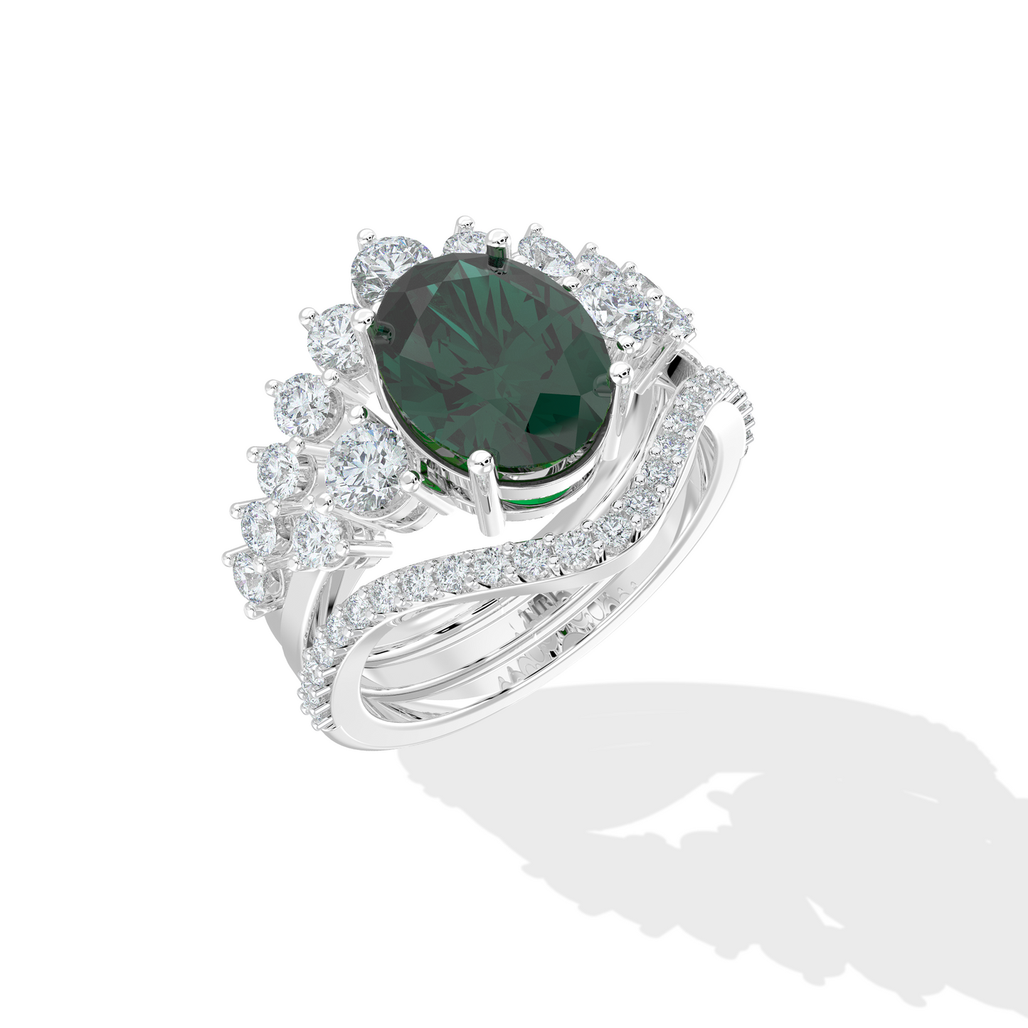 Luxury Silver ring featuring an oval deep green gemstone with a halo of round diamonds and a split diamond band, photographed on a white background