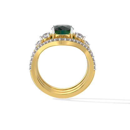 Luxury gold ring featuring an oval deep green gemstone with a halo of round diamonds and a split diamond band, photographed on a white background