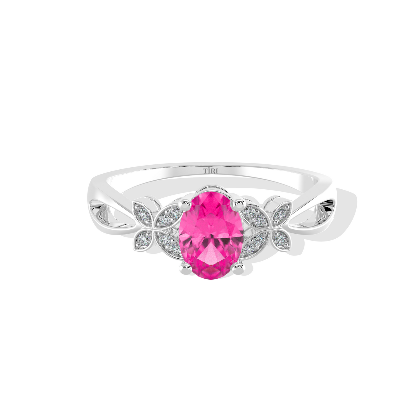 White gold ring with a pink gemstone on a white background
