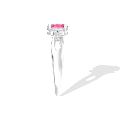 White gold ring with a pink gemstone on a white background