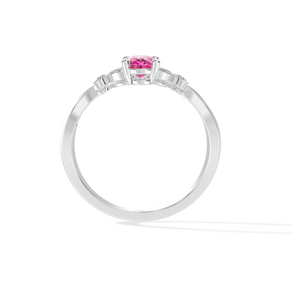 White gold ring with a pink gemstone on a white background