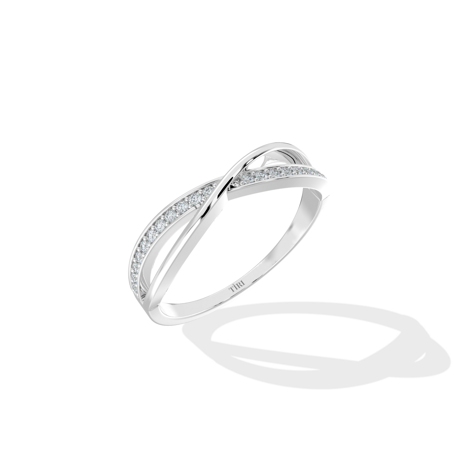 Silver engagement ring featuring a dark rectangular cushion-cut gemstone surrounded by a brilliant diamond halo