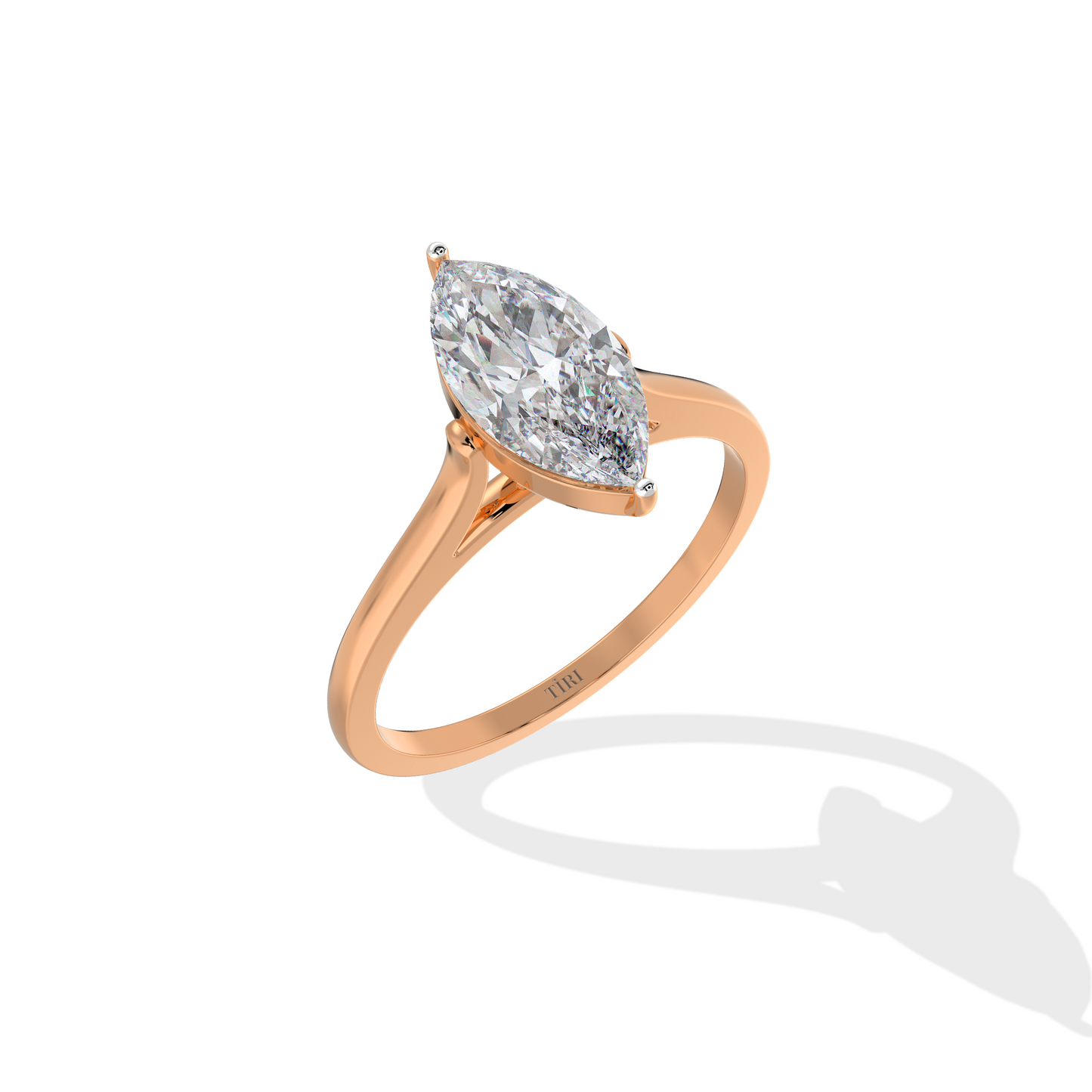 Marquise diamond ring in rose gold setting with delicate band, ideal for engagement or wedding