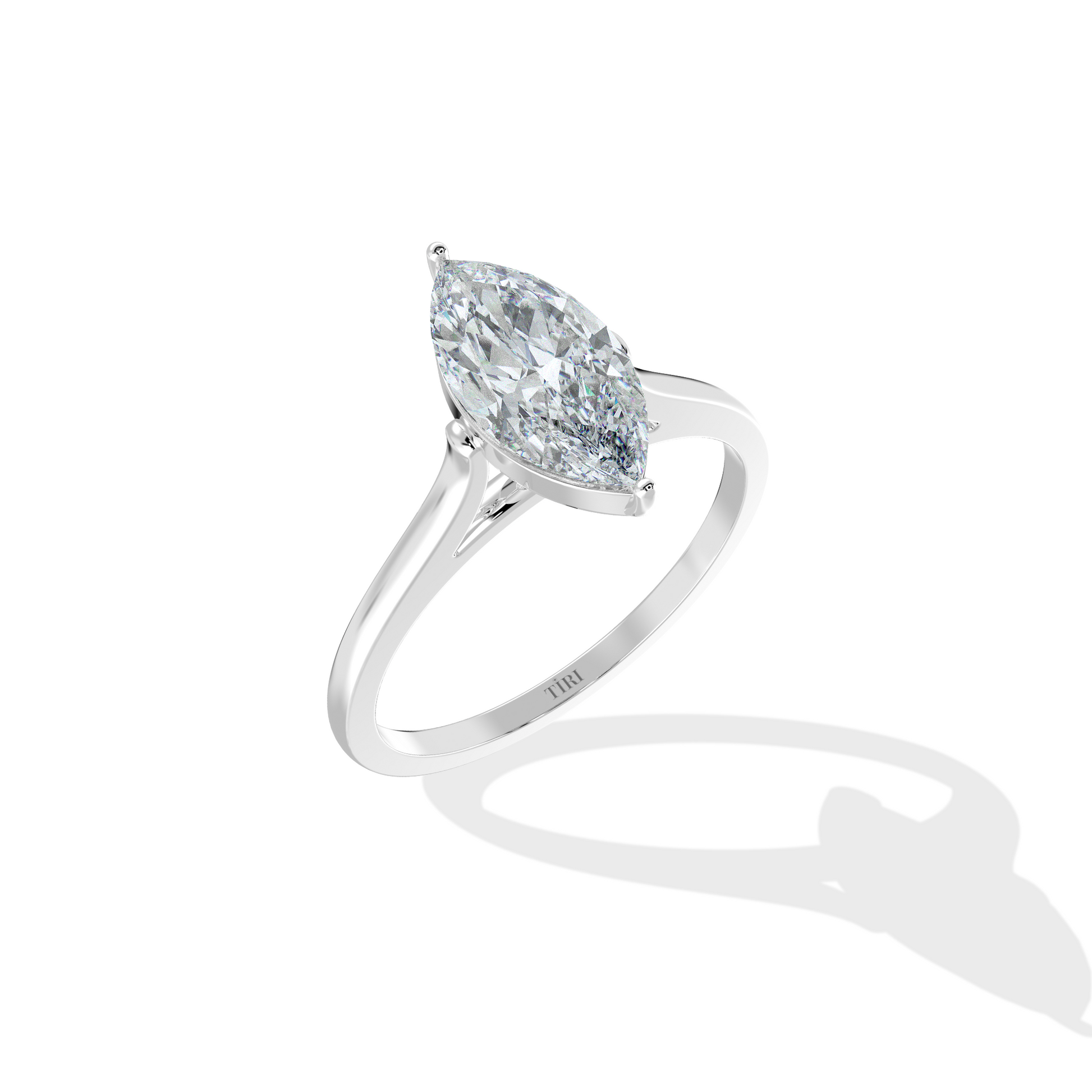 Tiri classic marquise solitaire ring with a sparkling 0.50ct to 4ct diamond, showcasing elegant design and craftsmanship.