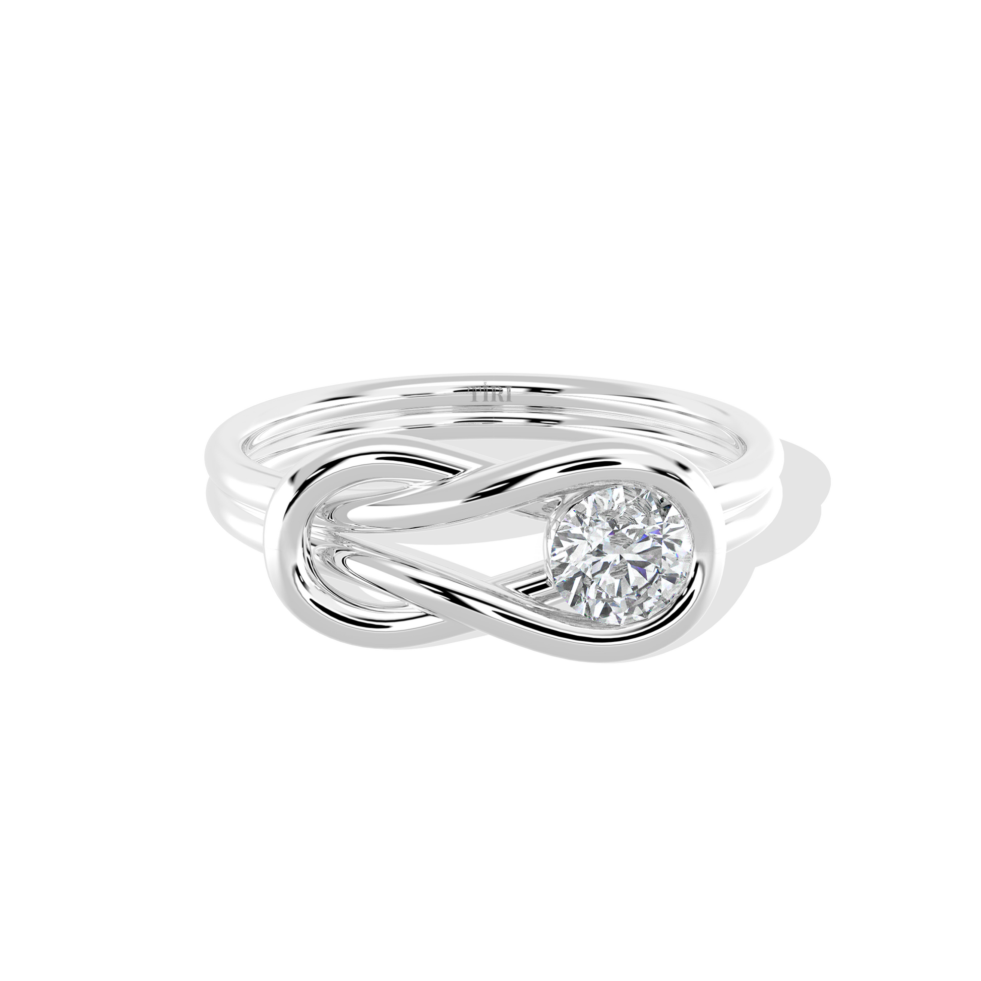 Silver Infinite Knot Ring by Tiri showing a sleek, polished band with an intricate infinite knot design.
