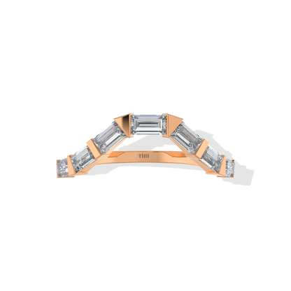 Tiri 0.70 TW diamond ring featuring a sleek, modern design with sparkling diamonds set in a polished band.