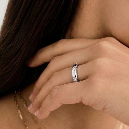 Silver minimal band ring by Tiri with sleek, smooth design showcasing contemporary jewelry craftsmanship.