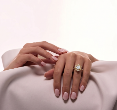 Close-up of a 1.5 TW Tiri diamond ring showcasing sparkling diamonds and intricate band design.