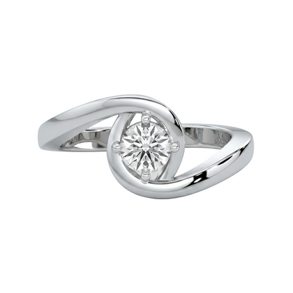 white gold ring with a diamond on a light gray background