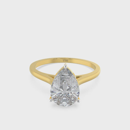 Yellow gold pear-cut diamond solitaire engagement ring