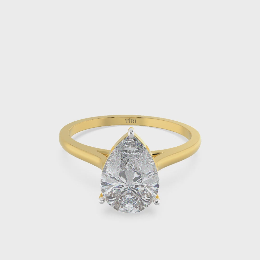 Yellow gold pear-cut diamond solitaire engagement ring