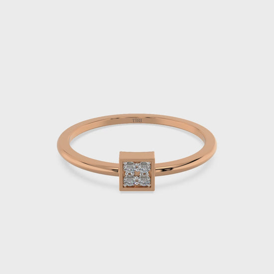 White gold diamond cluster ring with a round brilliant setting and pave accented band. Luxury fine jewelry.