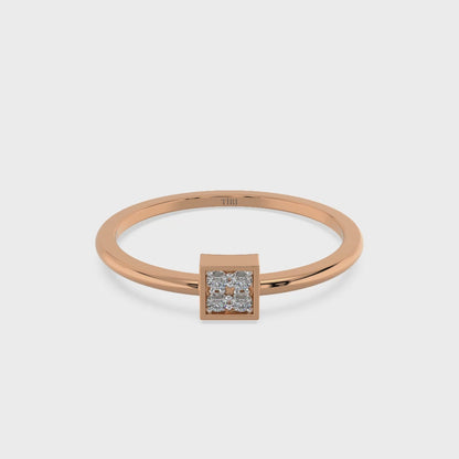 White gold diamond cluster ring with a round brilliant setting and pave accented band. Luxury fine jewelry.