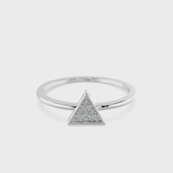 Silver ring with a triangular diamond-shaped center on a white background