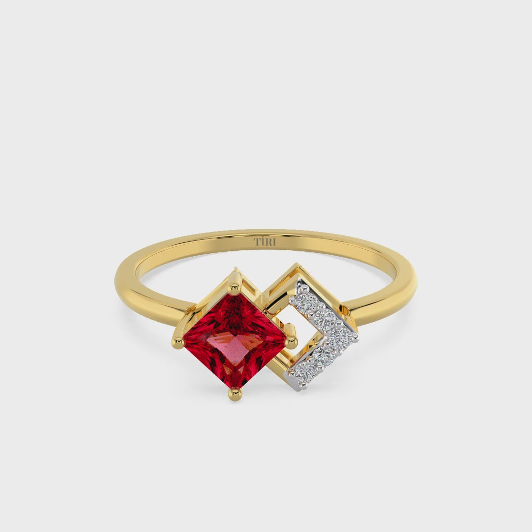 Elegant gold ring with princess-cut red gemstone and pave diamond geometric setting on white background