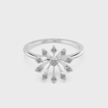 White gold round solitaire diamond engagement ring with a delicate thin band. Classic fine jewelry